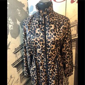 Great lightweight raincoat by CISONO size small